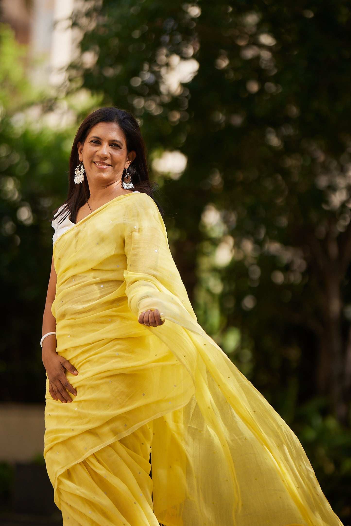 Lemon Yellow Mulmul cotton Sequin Saree with Tassels