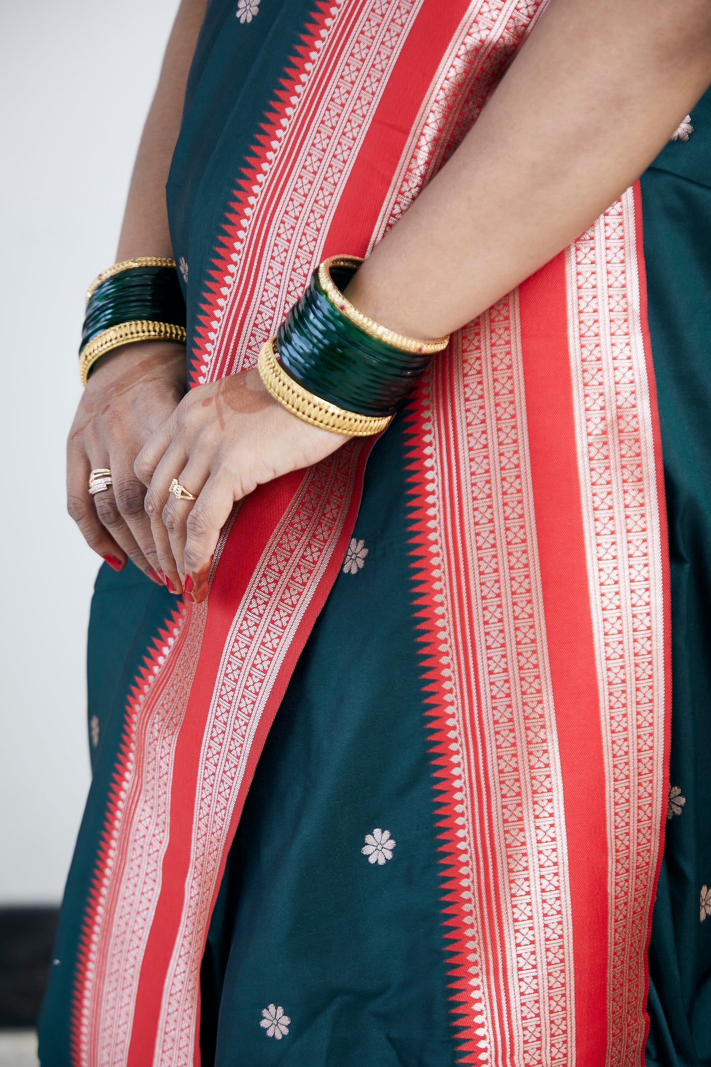 Coral Red & Bottle Green Nauvari Kanjivaram Silk blend Paithani Saree with unstitched blouse.