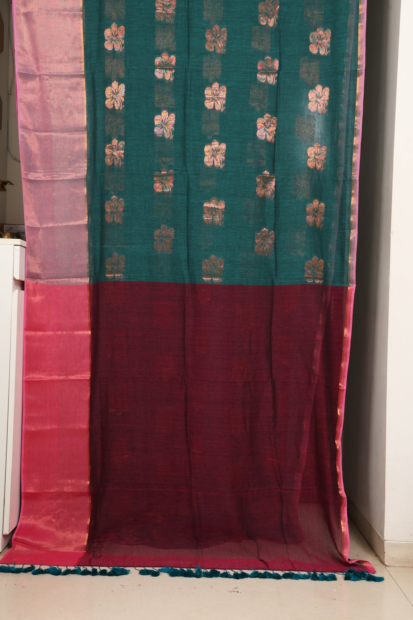 Peacock Green Mulmul Saree with Floral Zari Butti and Border