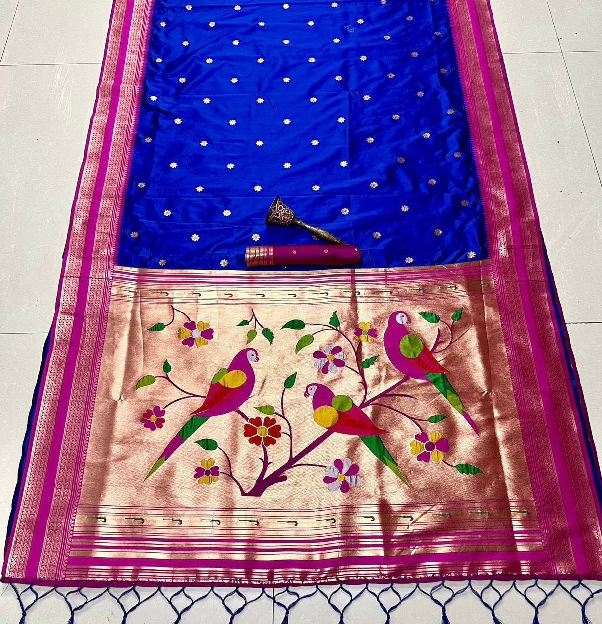 Rani & Royal Blue Nauvari Kanjivaram Silk blend Paithani Saree with unstitched blouse.