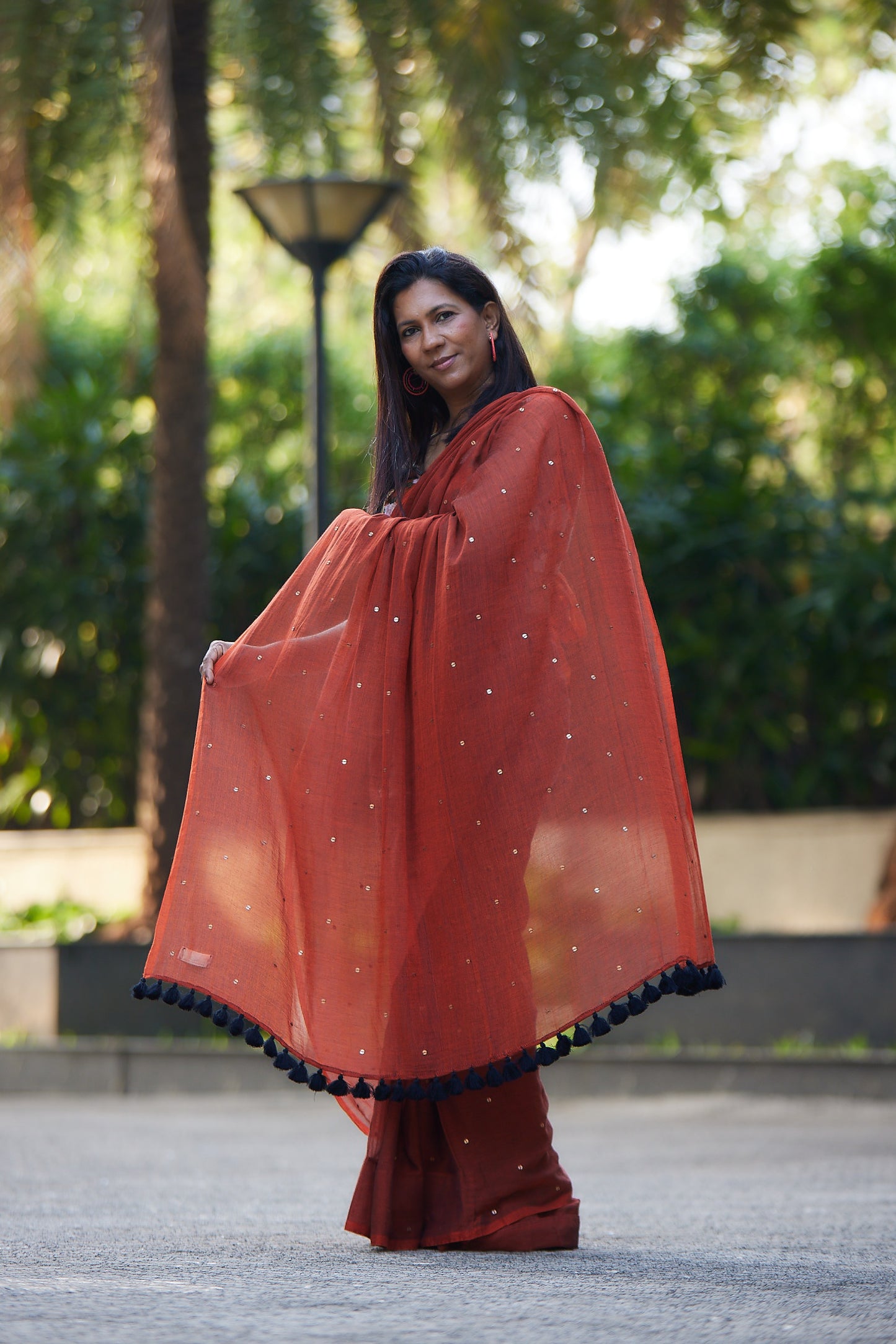 Rust Mulmul cotton Sequin Saree with Tassels