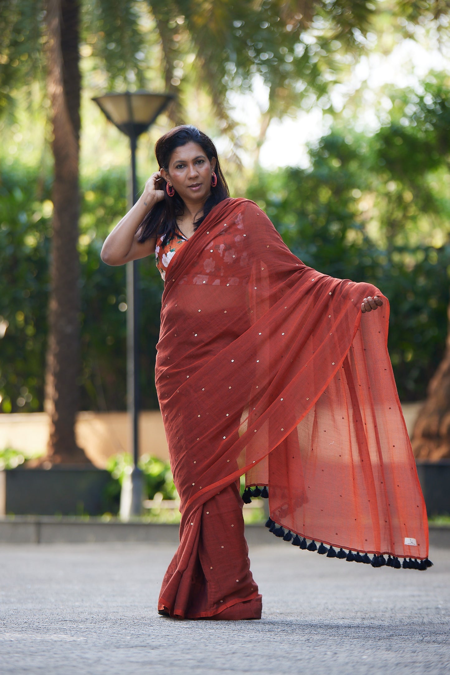 Rust Mulmul cotton Sequin Saree with Tassels