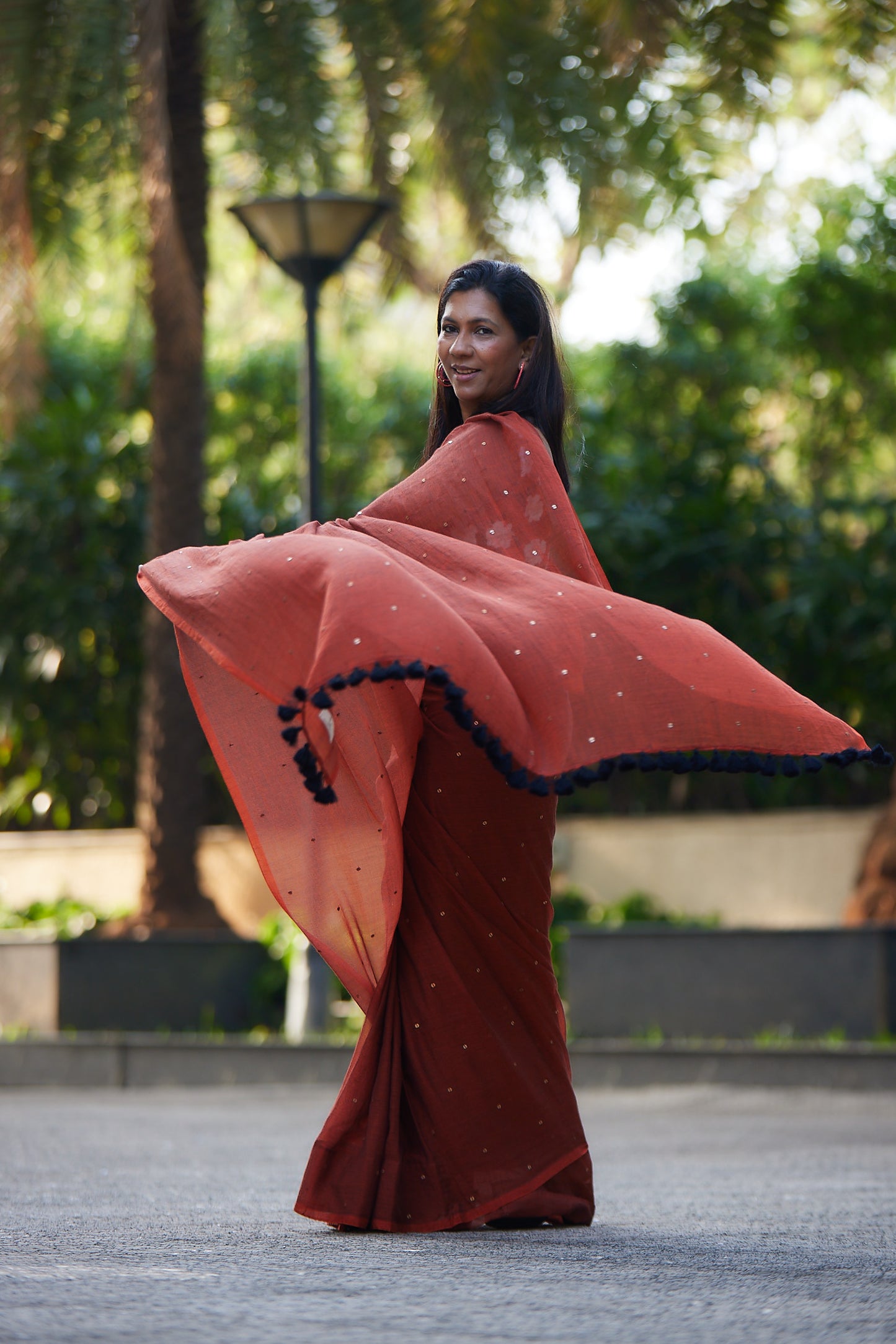 Rust Mulmul cotton Sequin Saree with Tassels