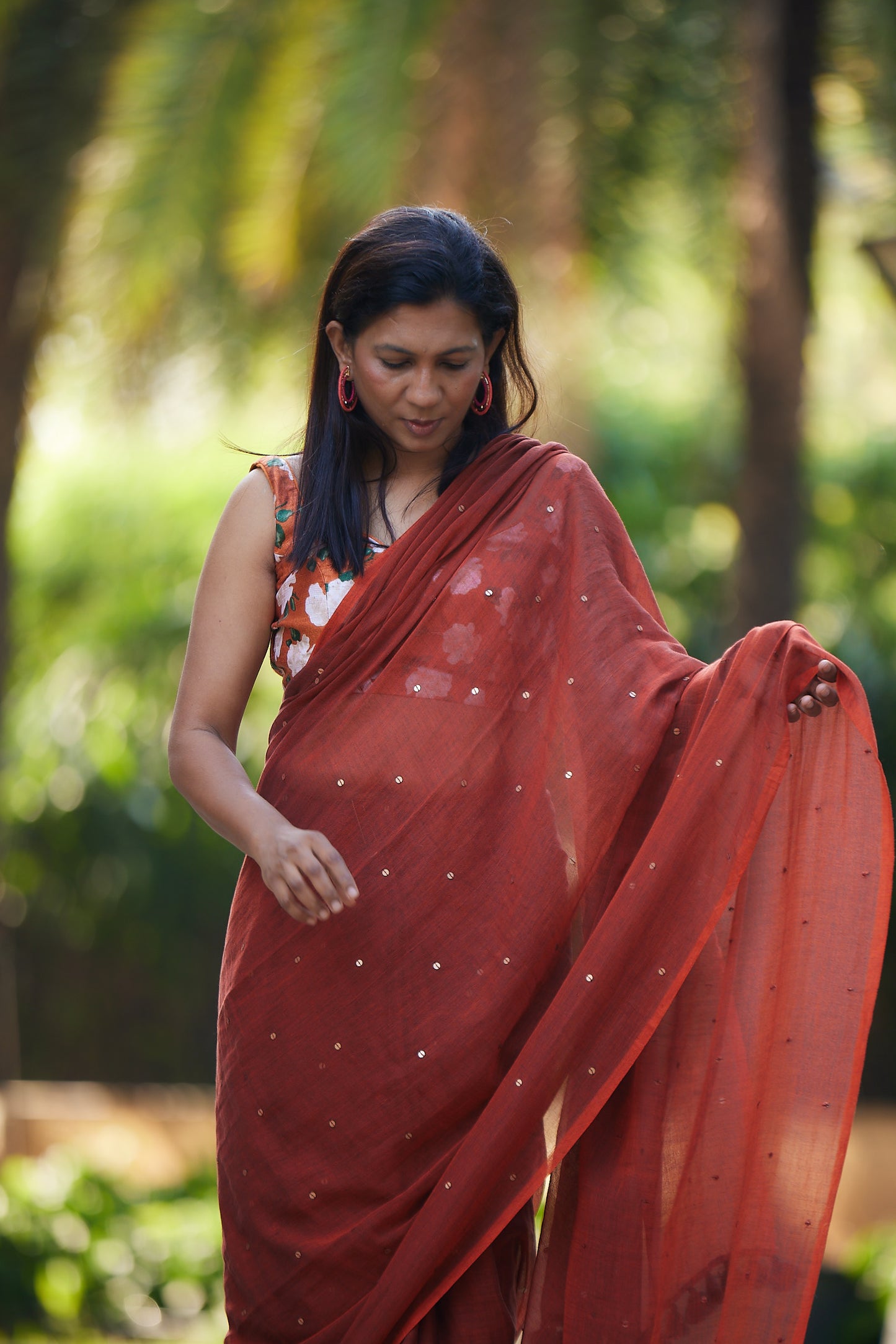 Rust Mulmul cotton Sequin Saree with Tassels