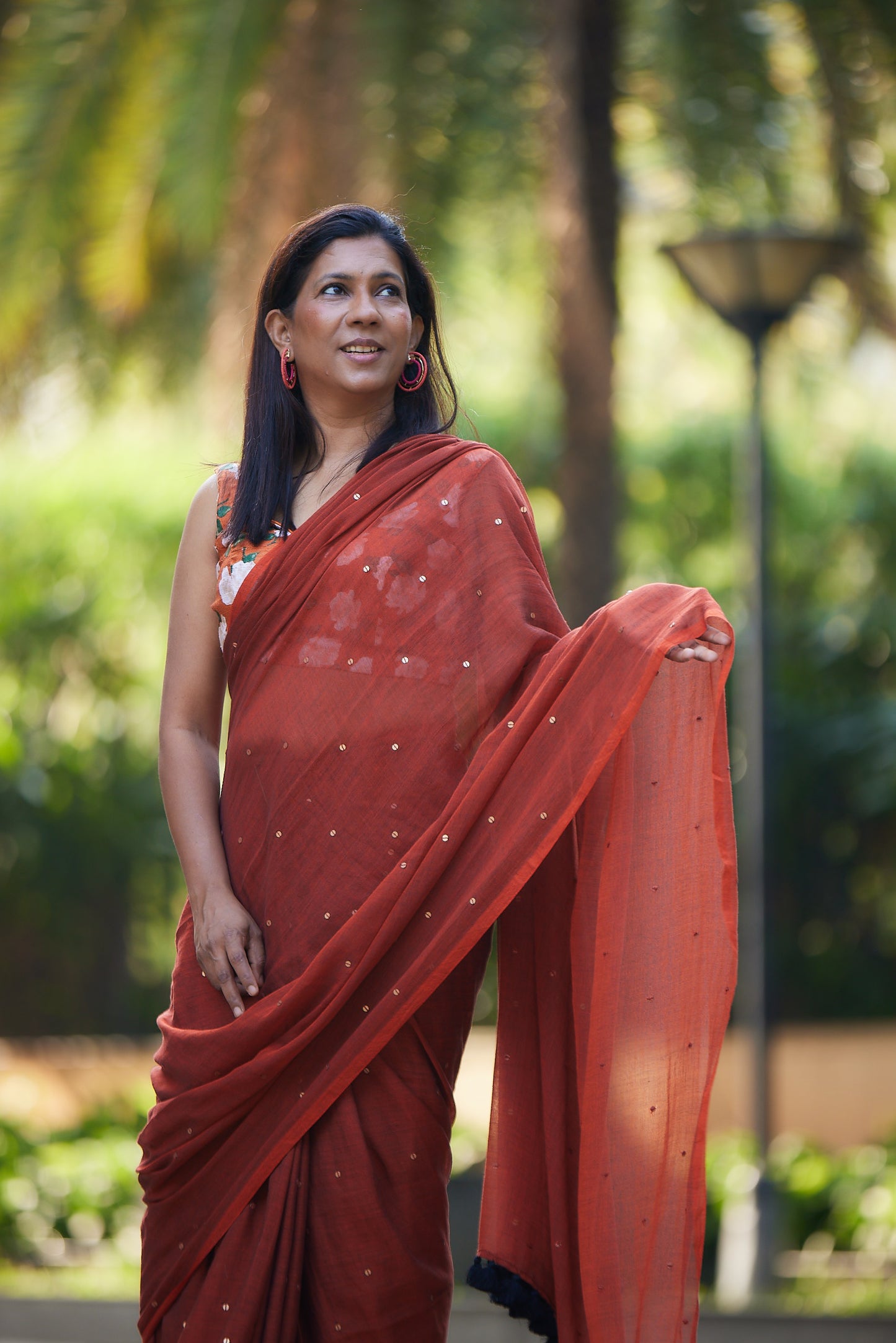 Rust Mulmul cotton Sequin Saree with Tassels