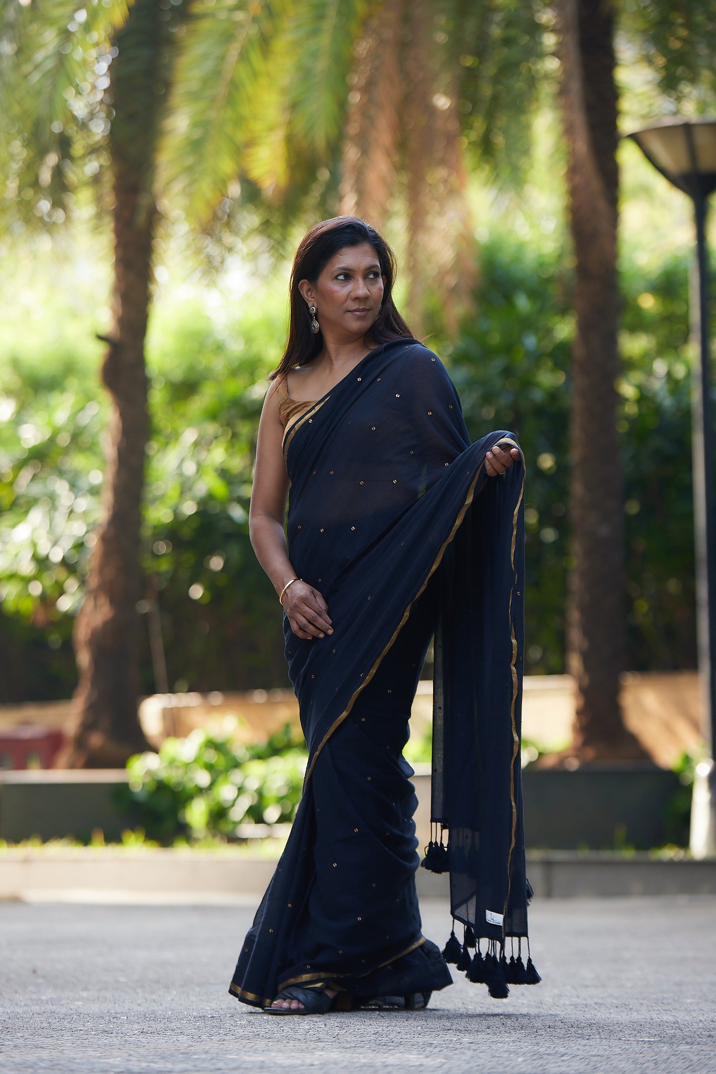 Black Mulmul cotton Sequin Saree with Tassels