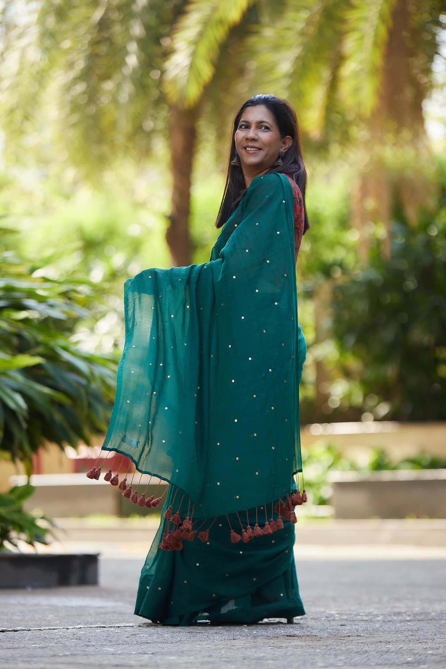 Bottle Green Mulmul cotton Sequin Saree with Tassels