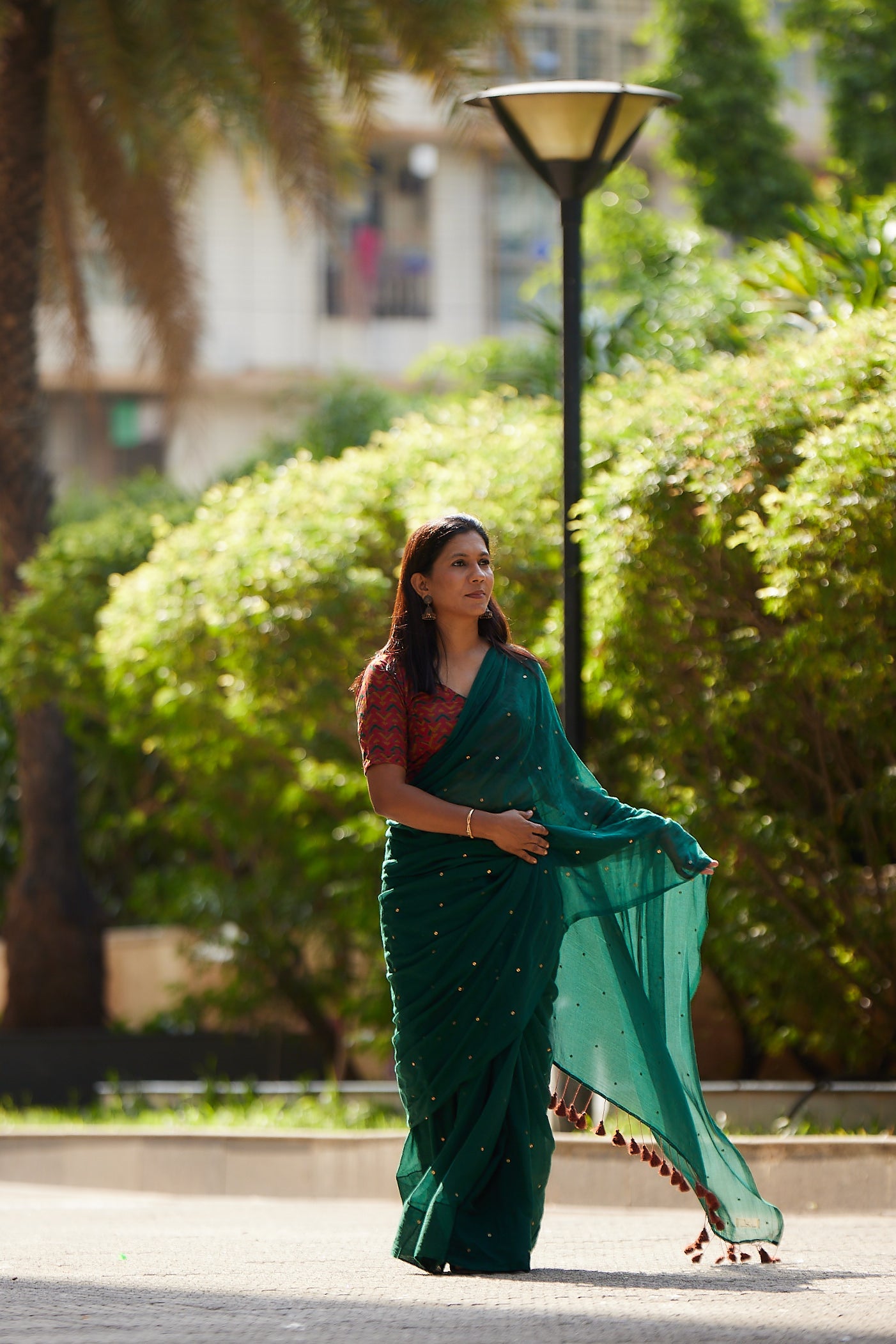Bottle Green Mulmul cotton Sequin Saree with Tassels