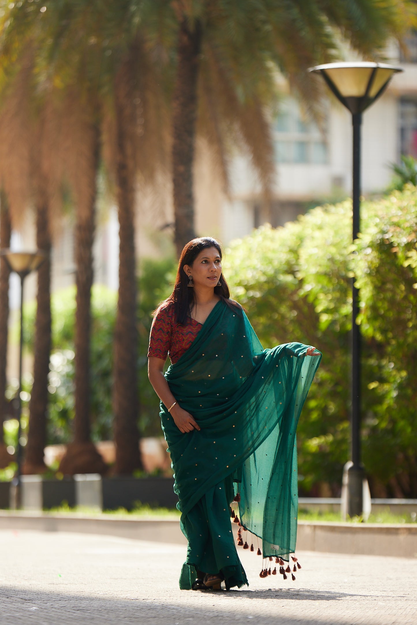 Bottle Green Mulmul cotton Sequin Saree with Tassels