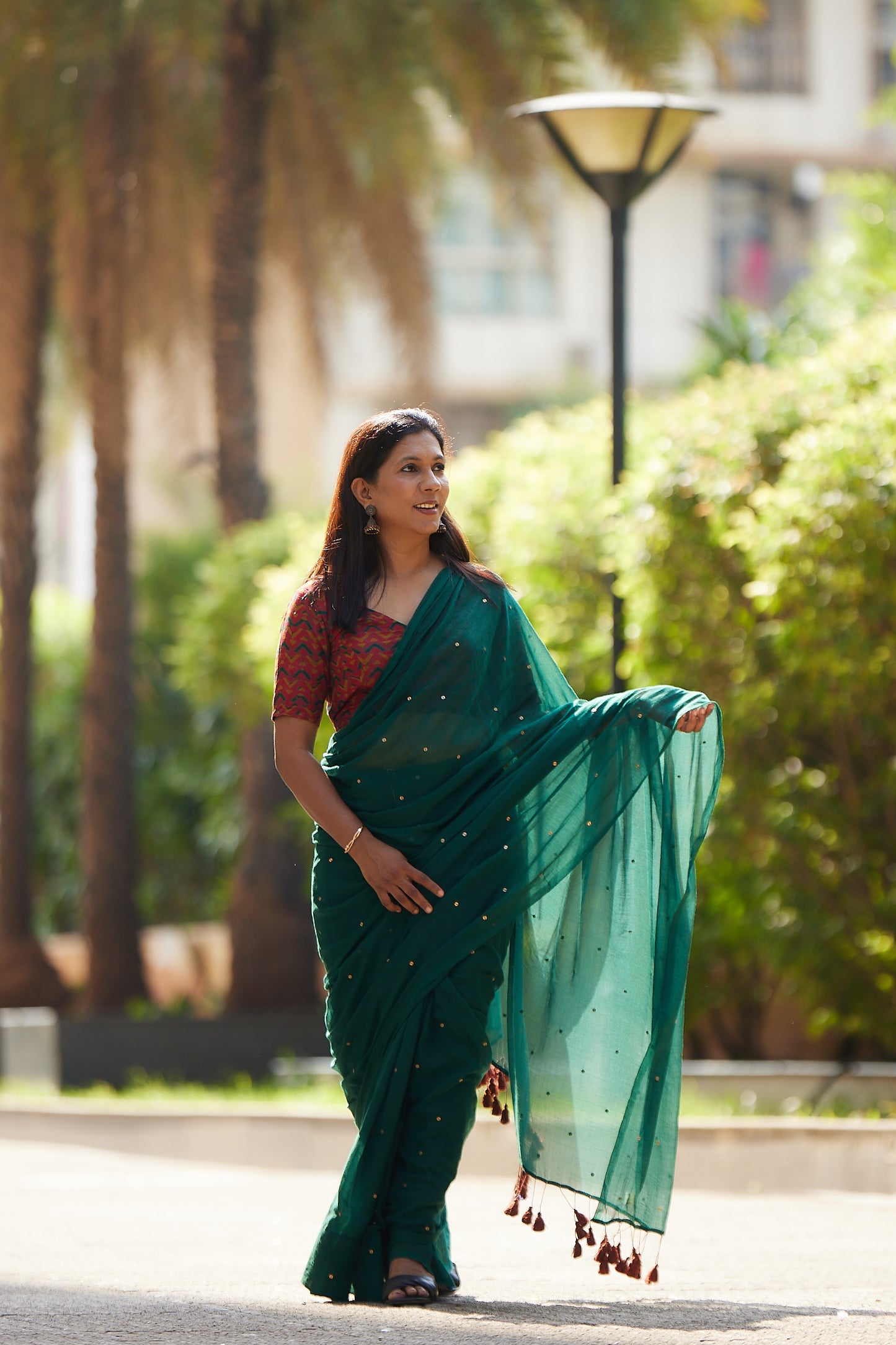 Bottle Green Mulmul cotton Sequin Saree with Tassels
