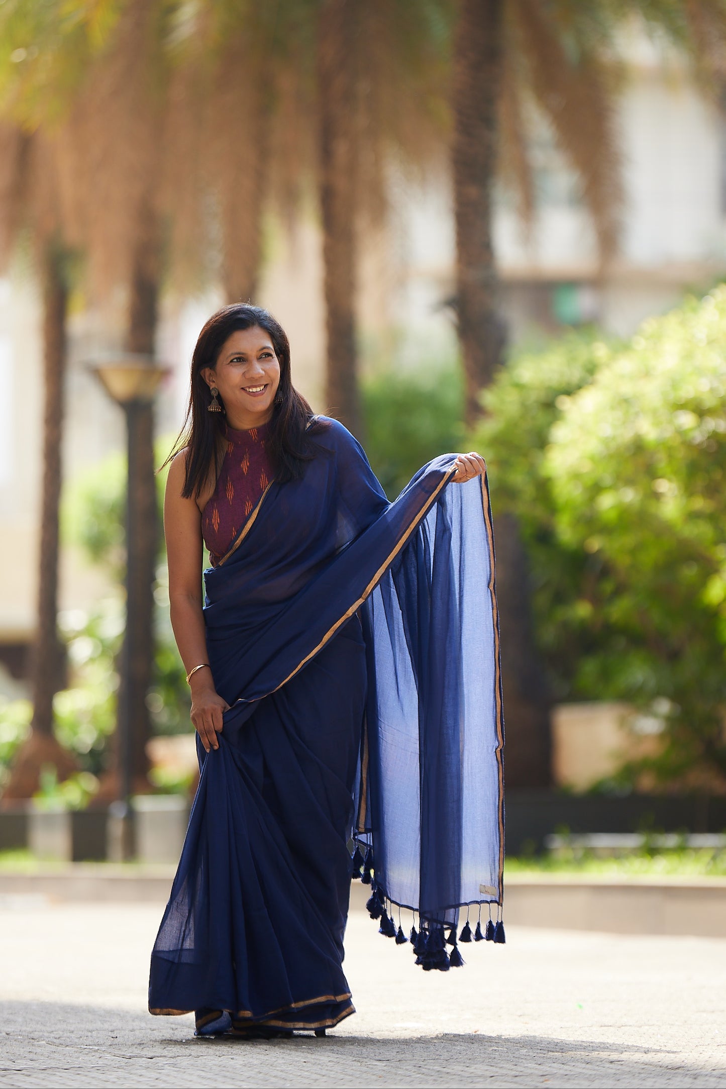 Navy Blue cotton saree with Golden Zari Border and Tassels