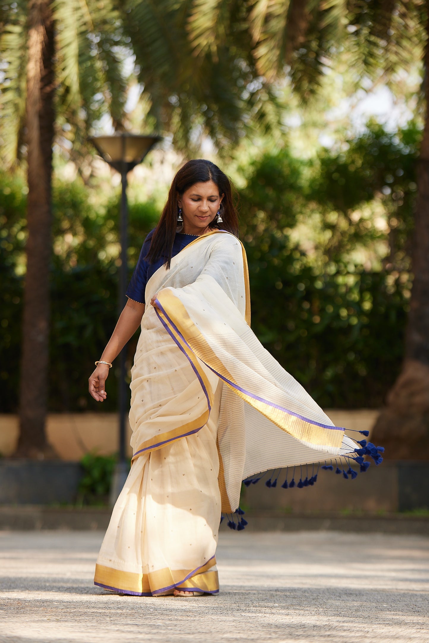 Off white Purple Border Mulmul Cotton Saree with Tassels