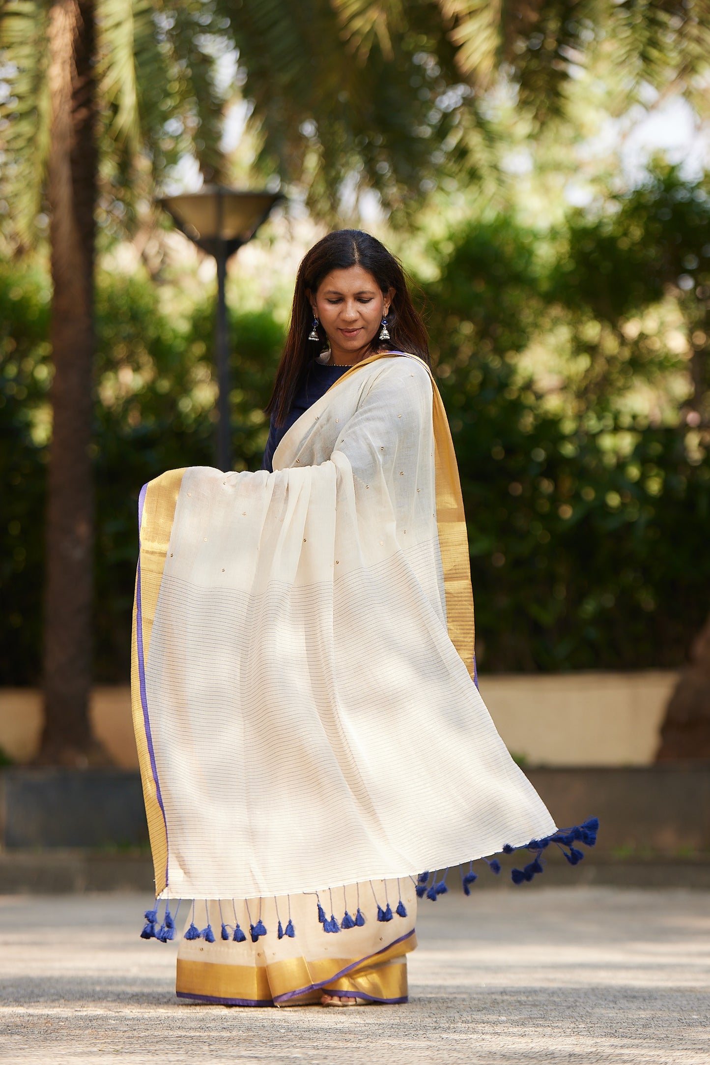 Off white Purple Border Mulmul Cotton Saree with Tassels