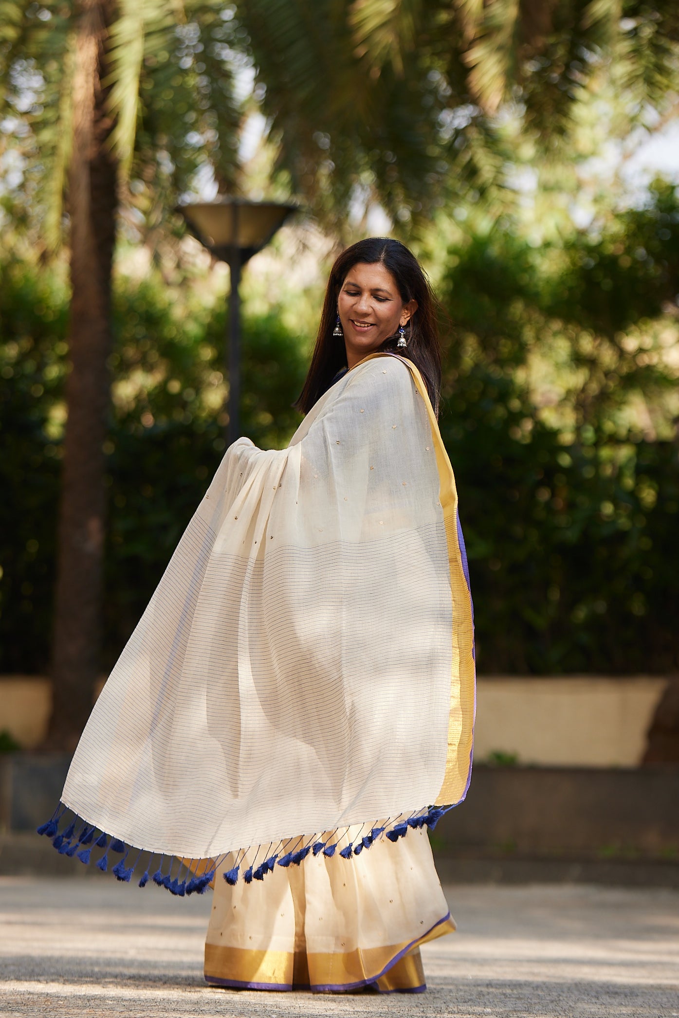 Off white Purple Border Mulmul Cotton Saree with Tassels