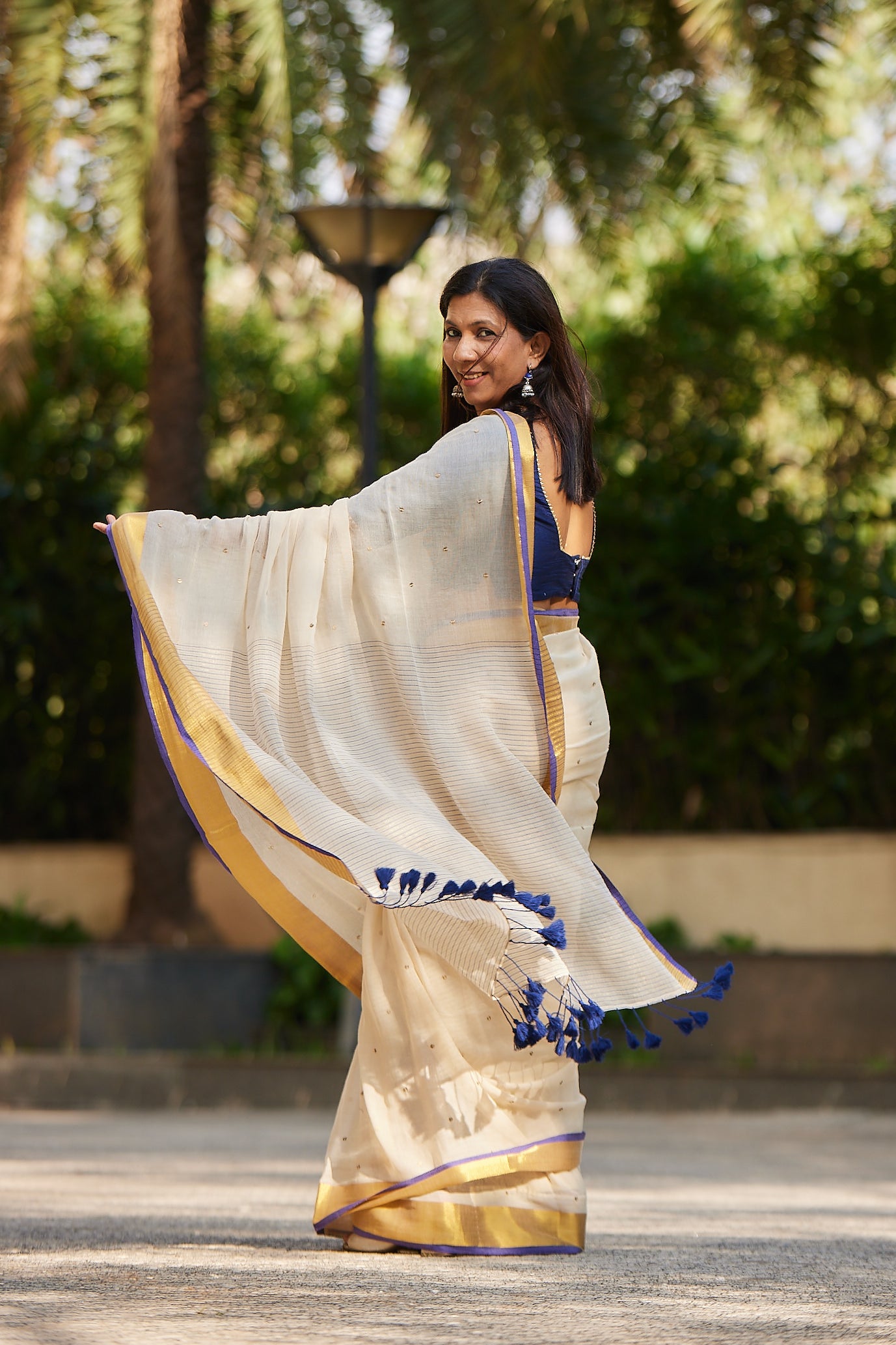 Off white Purple Border Mulmul Cotton Saree with Tassels