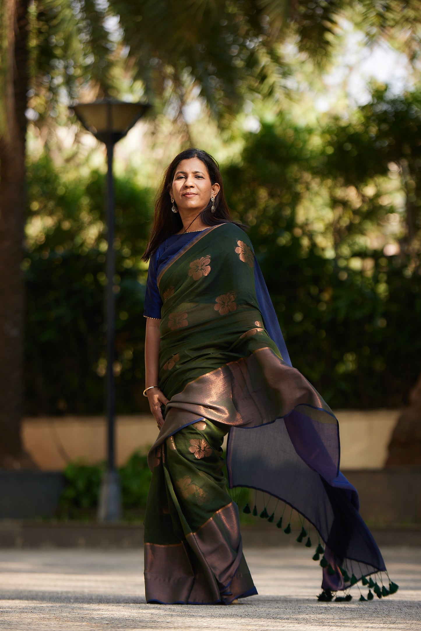 Emerald Green Mulmul Saree with Floral Zari Butti and Border