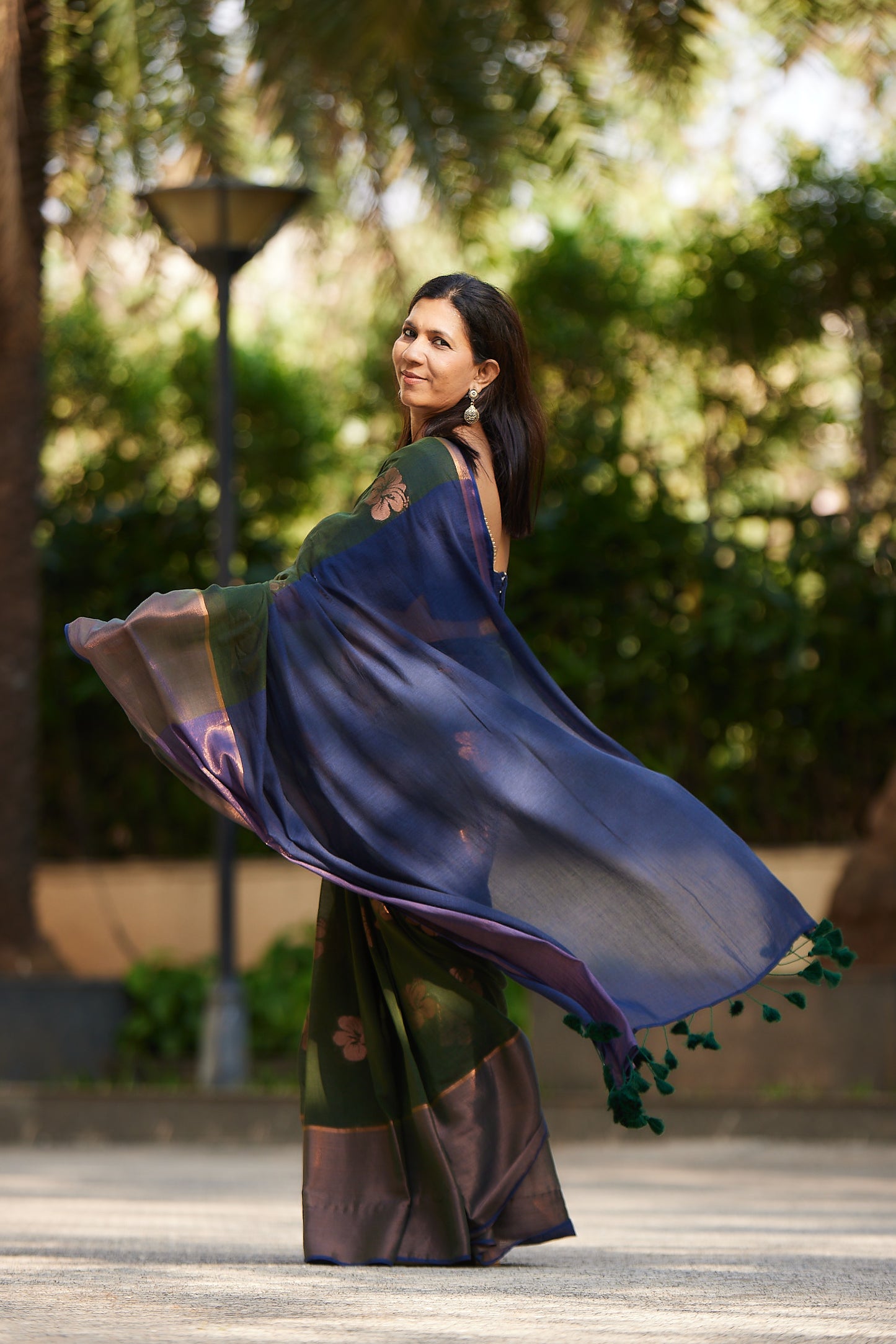 Emerald Green Mulmul Saree with Floral Zari Butti and Border