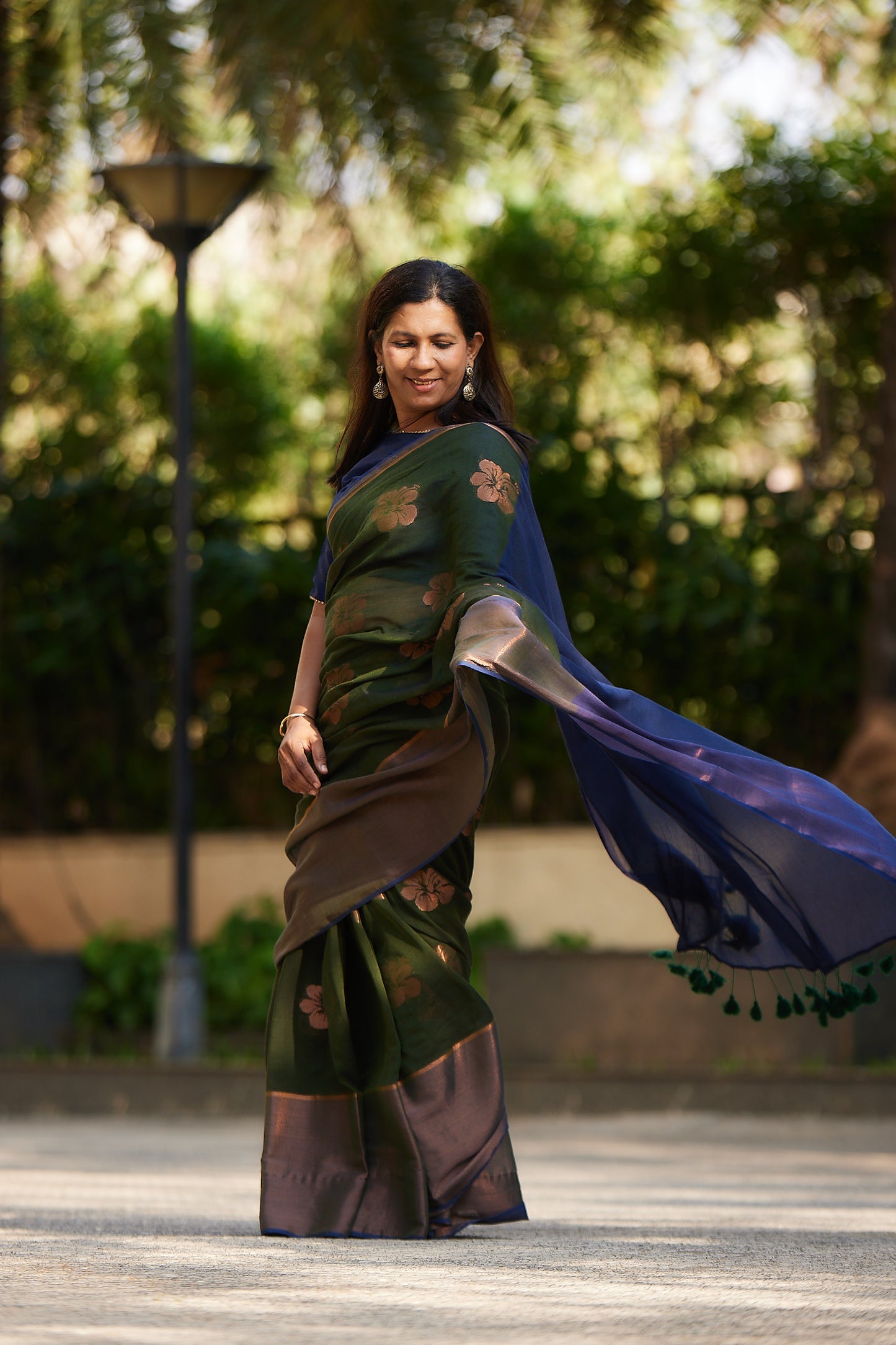 Emerald Green Mulmul Saree with Floral Zari Butti and Border