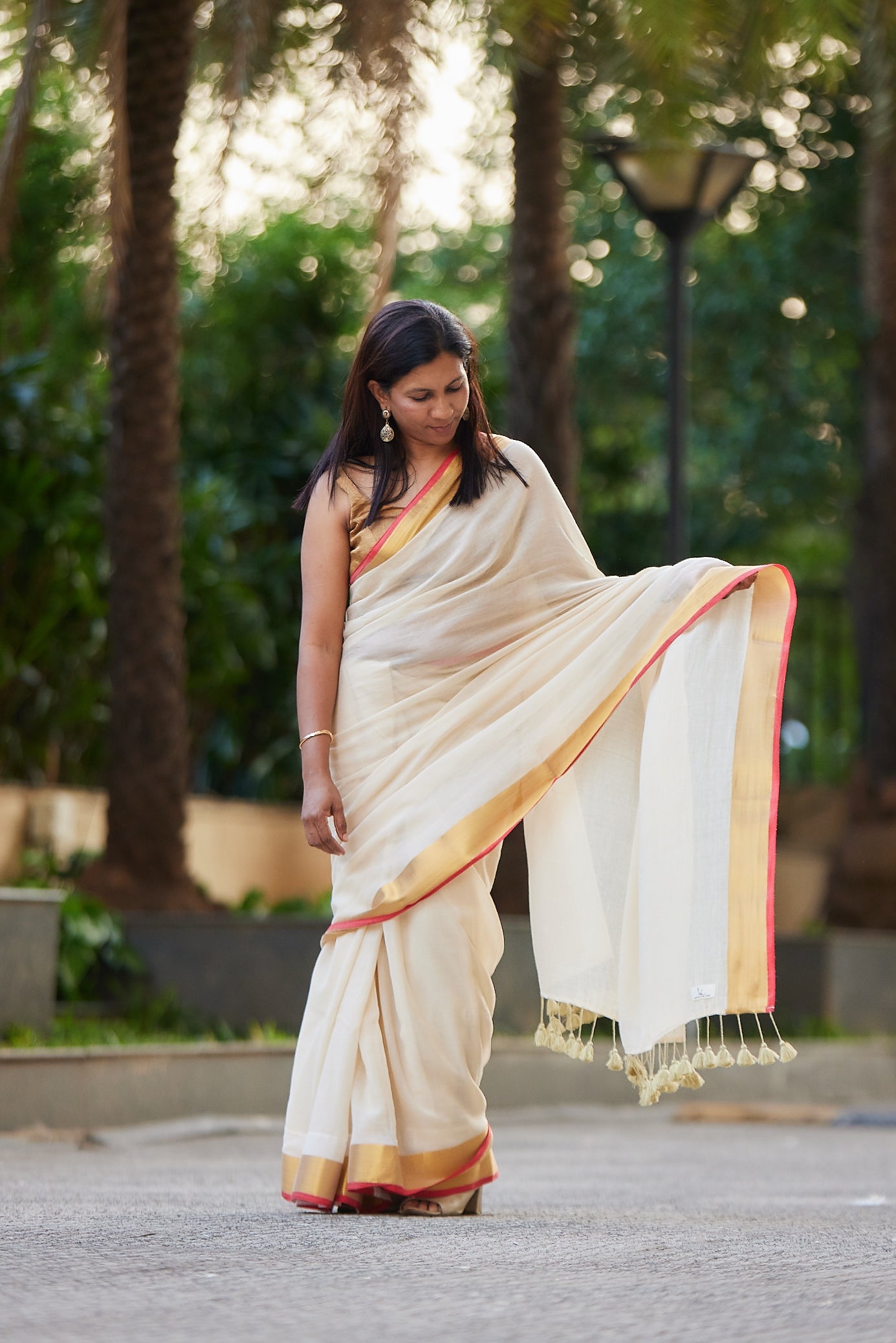 Off white Red Border Mulmul Cotton Saree with Tassels