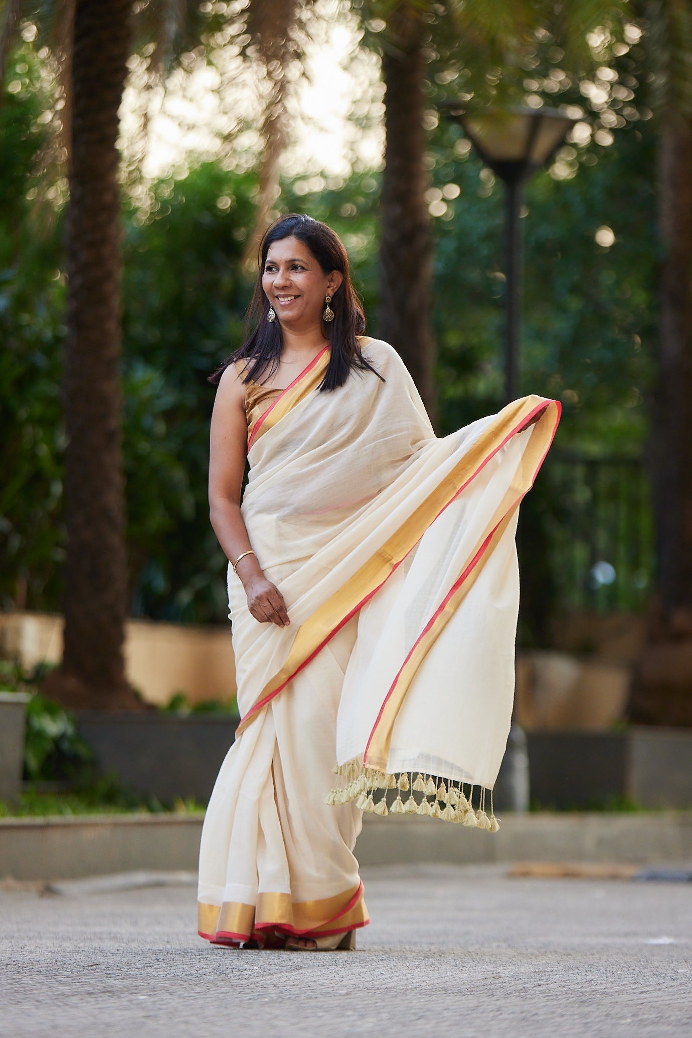 Off white Red Border Mulmul Cotton Saree with Tassels