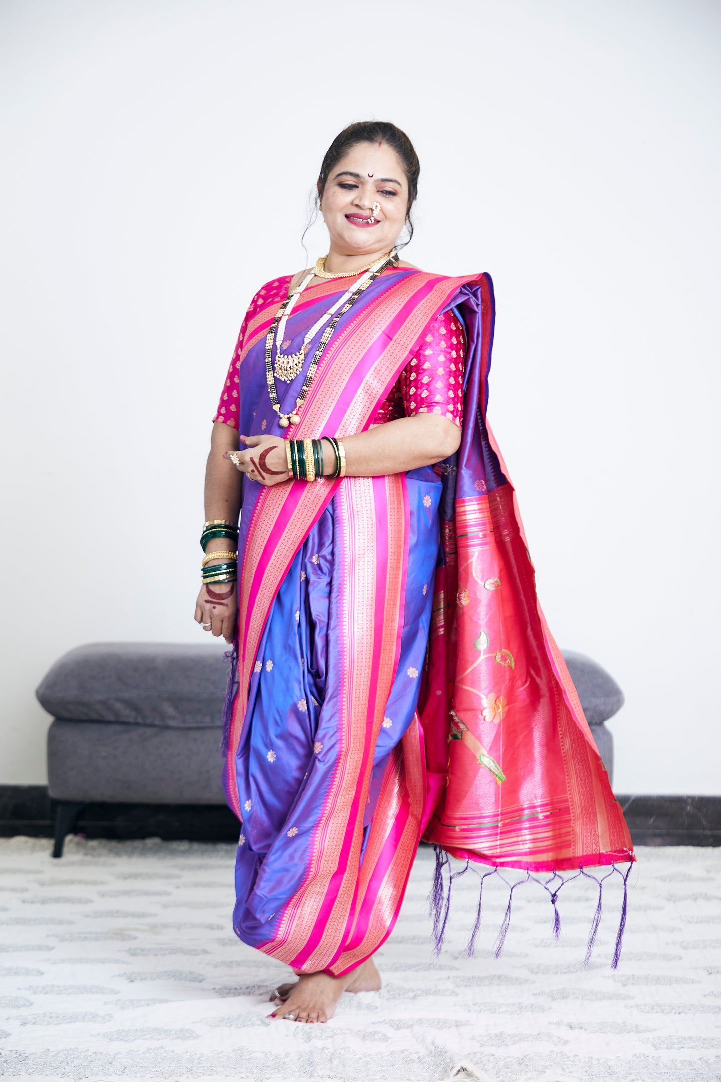 Rani & Royal Purple Nauvari Kanjivaram Silk blend Paithani Saree with unstitched blouse.