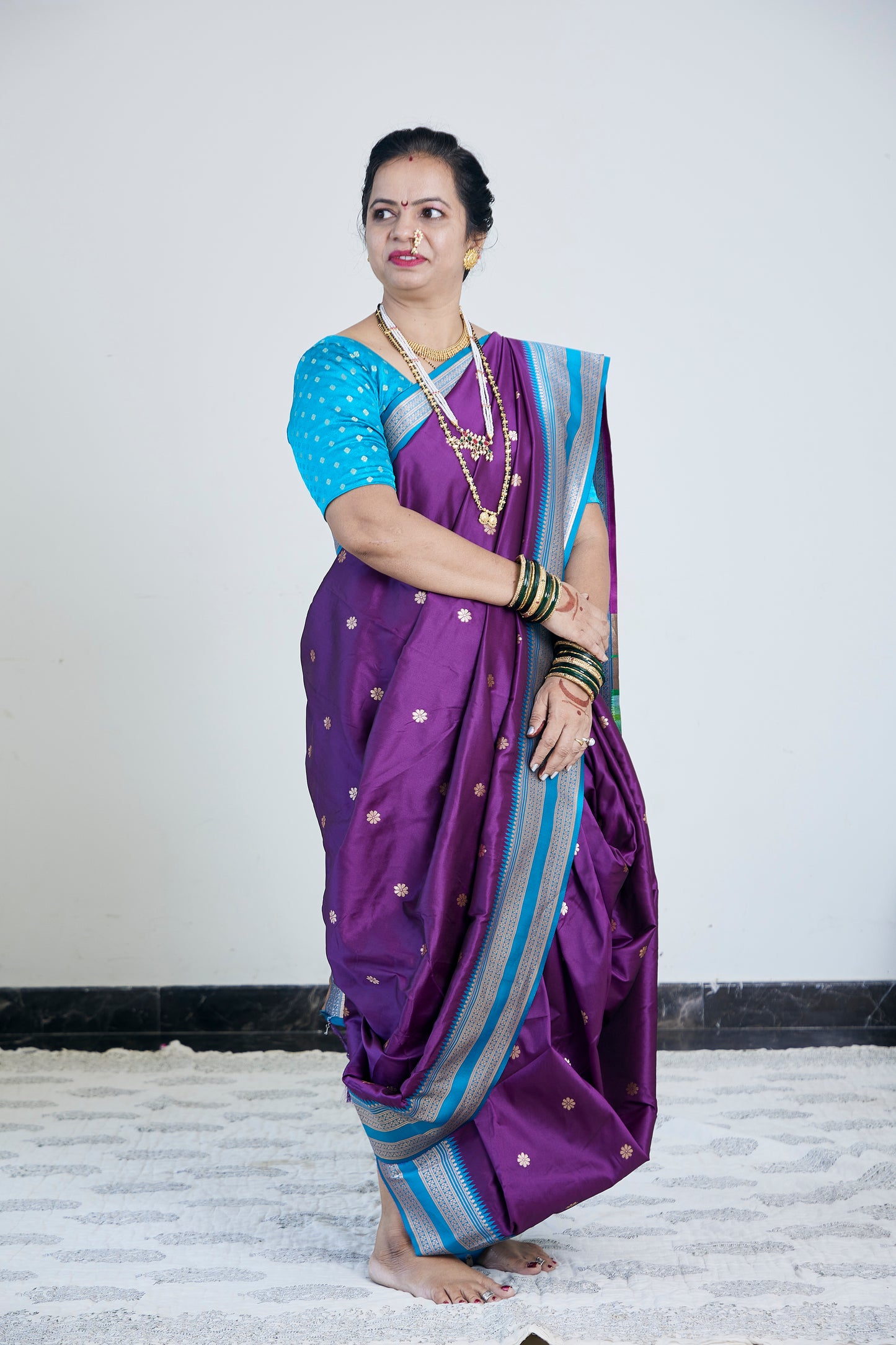 Turquoise Blue & Purple Nauvari Kanjivaram Silk blend Paithani Saree with unstitched blouse.