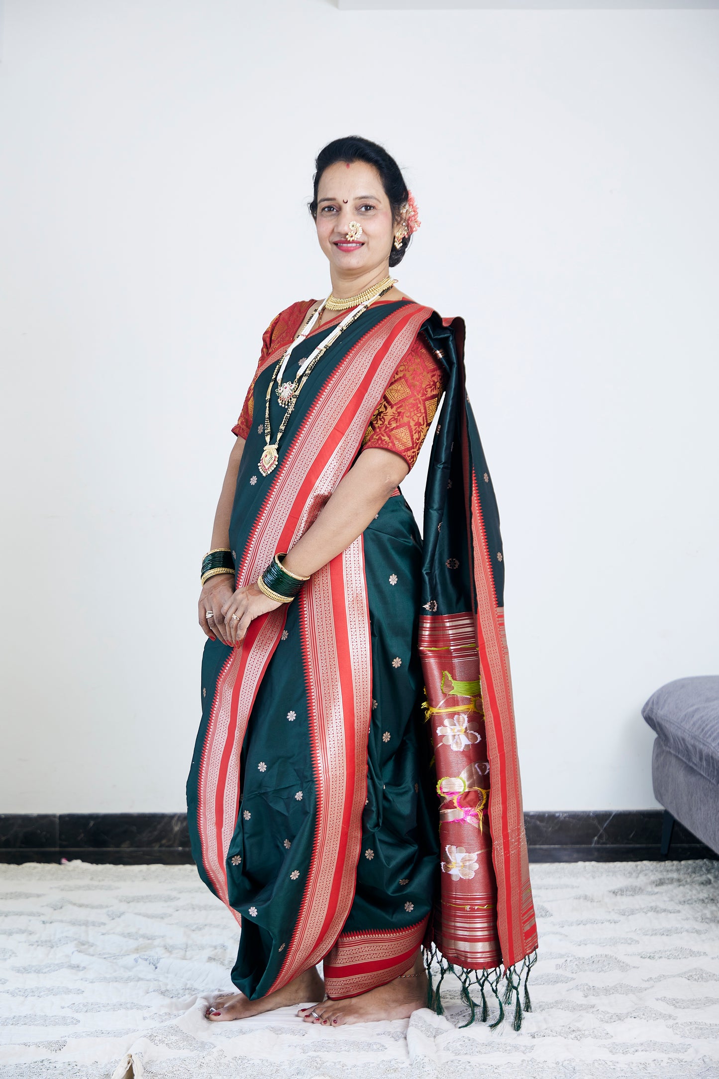 Coral Red & Bottle Green Nauvari Kanjivaram Silk blend Paithani Saree with unstitched blouse.